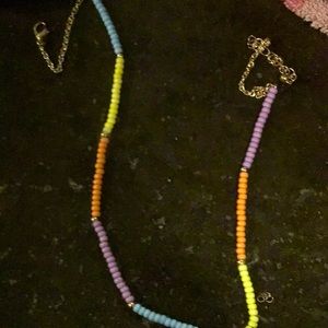 The flower necklace was made by me and the rainbow was bought from target
